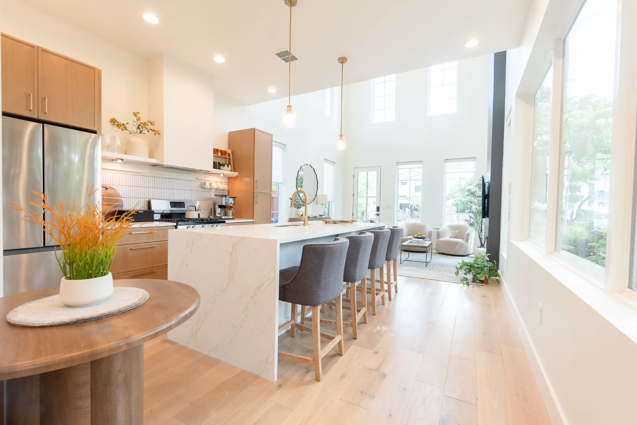 Open kitchen, dining, and living spaces designed for groups to gather